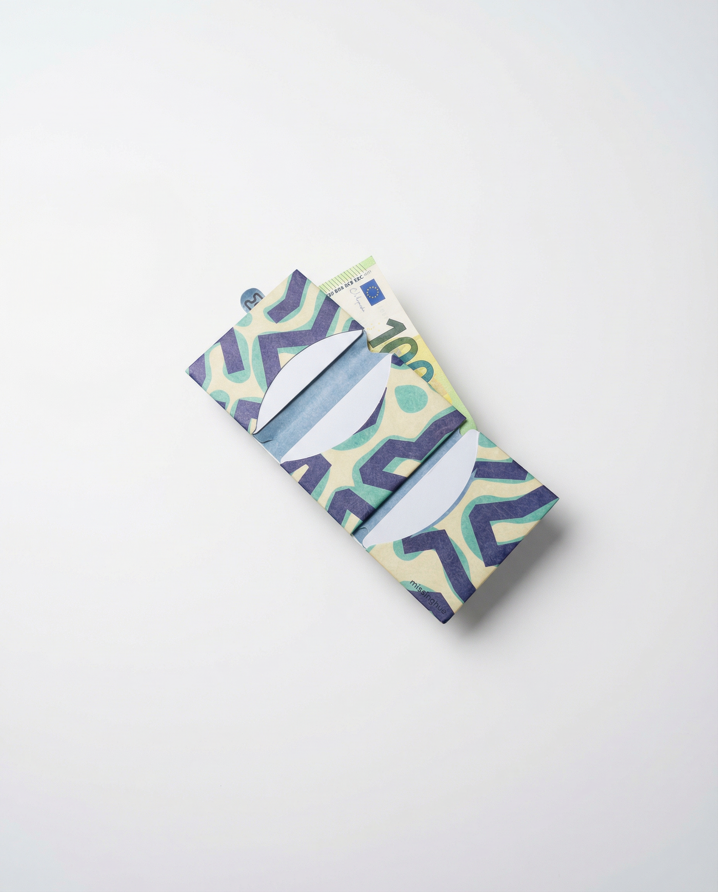 paths miniwallet held in hand, thin tyvek wallet