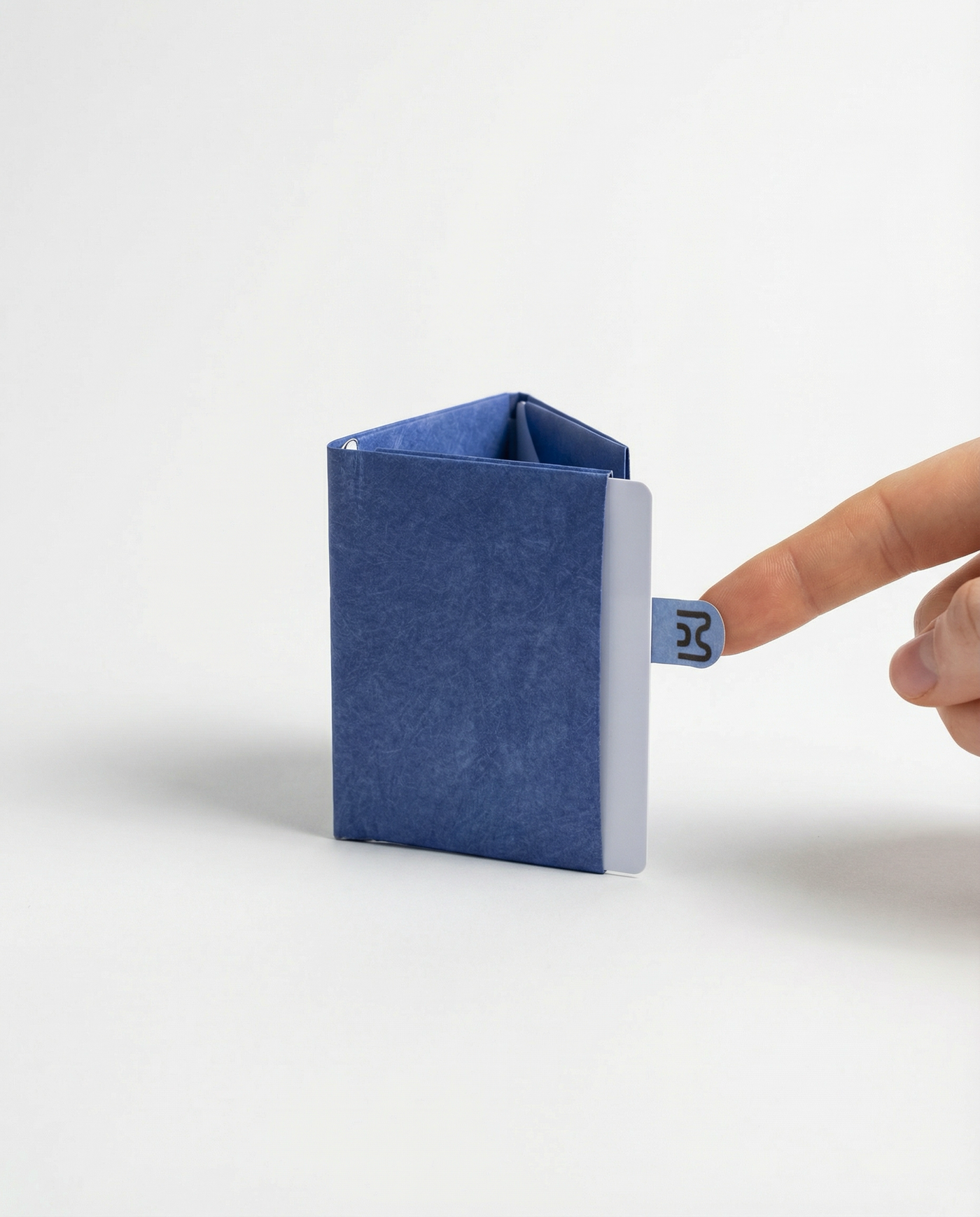 blue miniwallet with cards, pull-tab visible