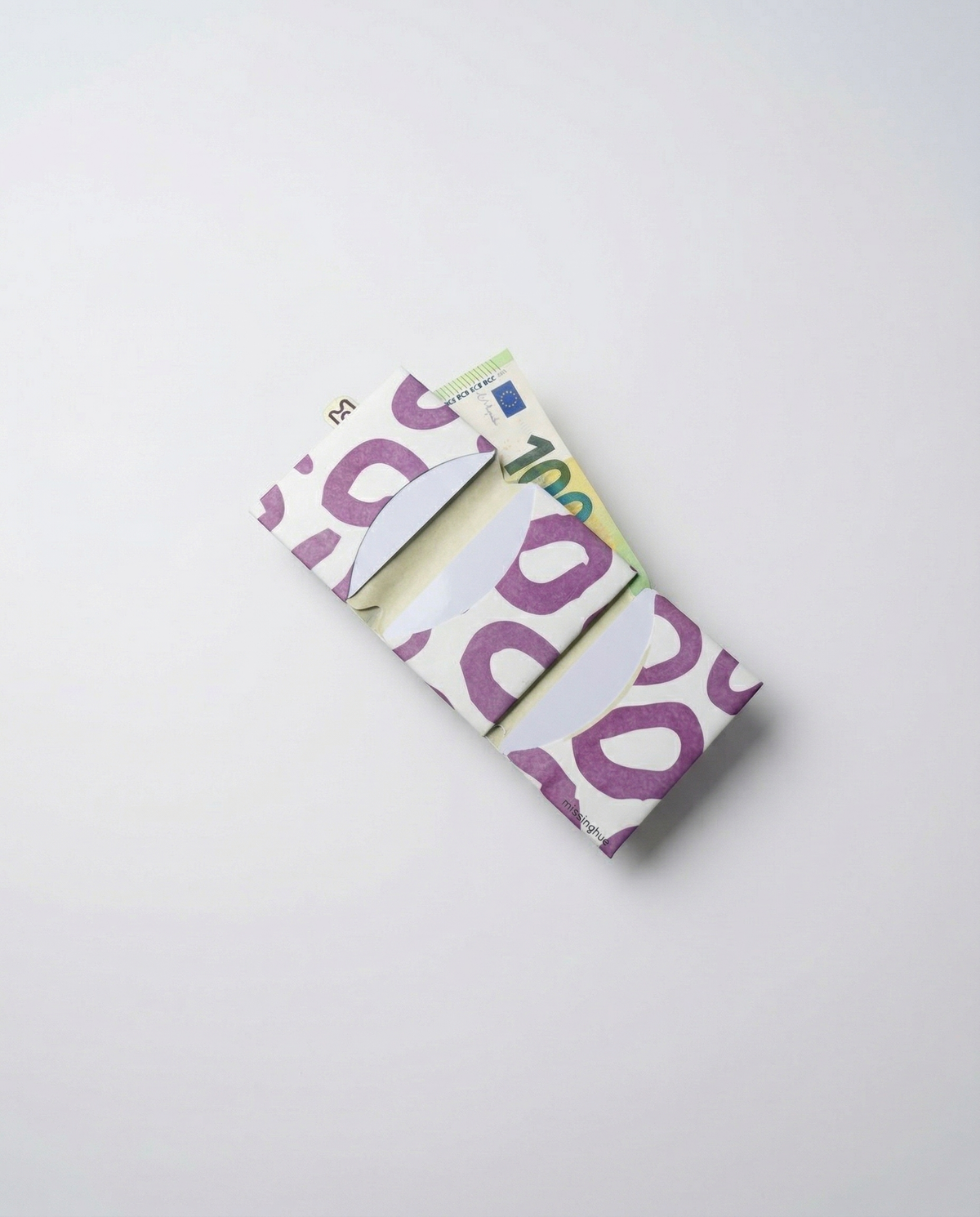leopard tyvek card wallet open with cash, bills lying flat