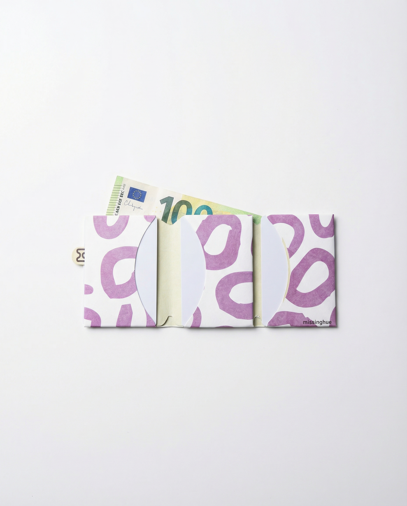 leopard miniwallet open with cash, bills lying flat