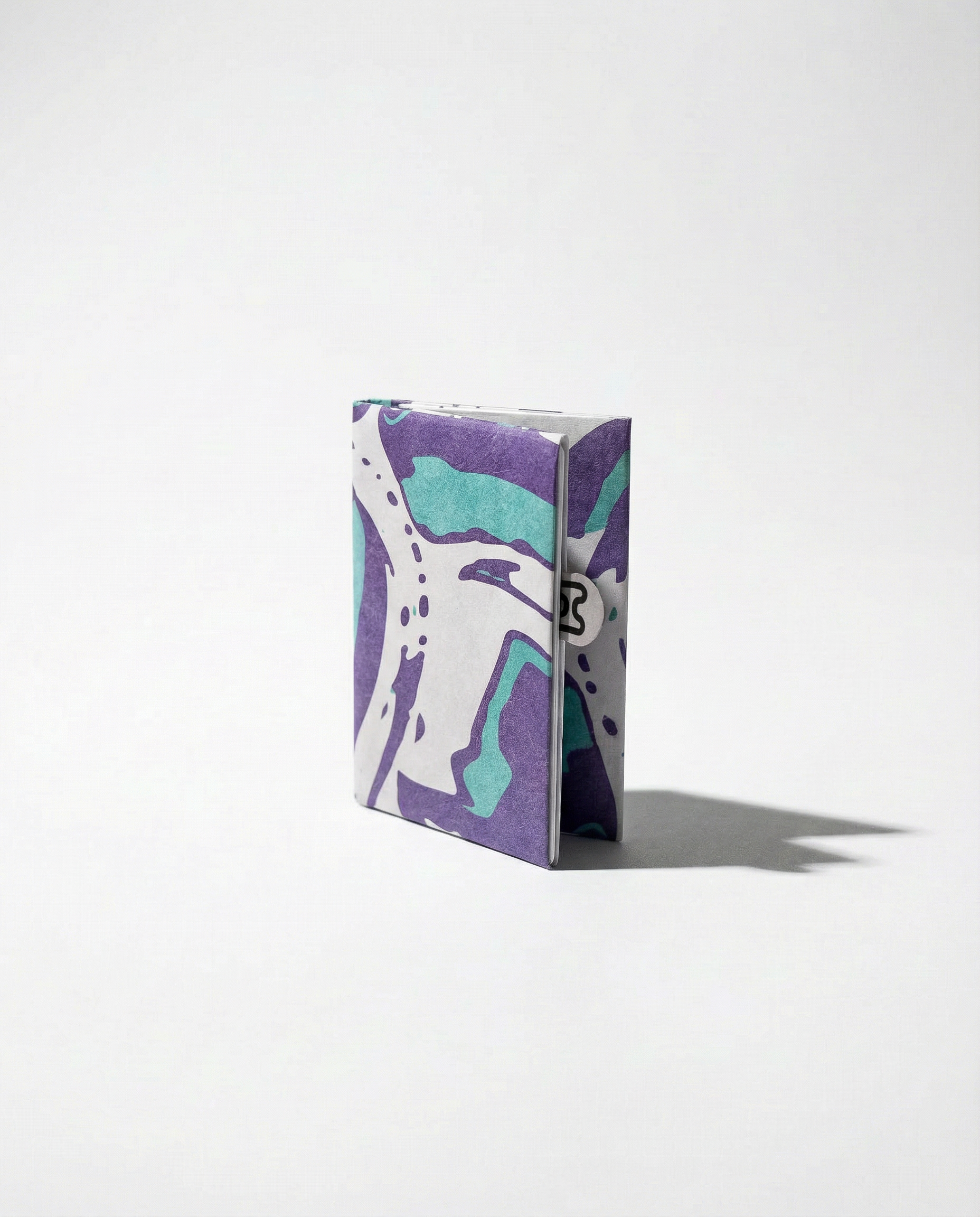 liquified cold thin tyvek wallet, front view rotated