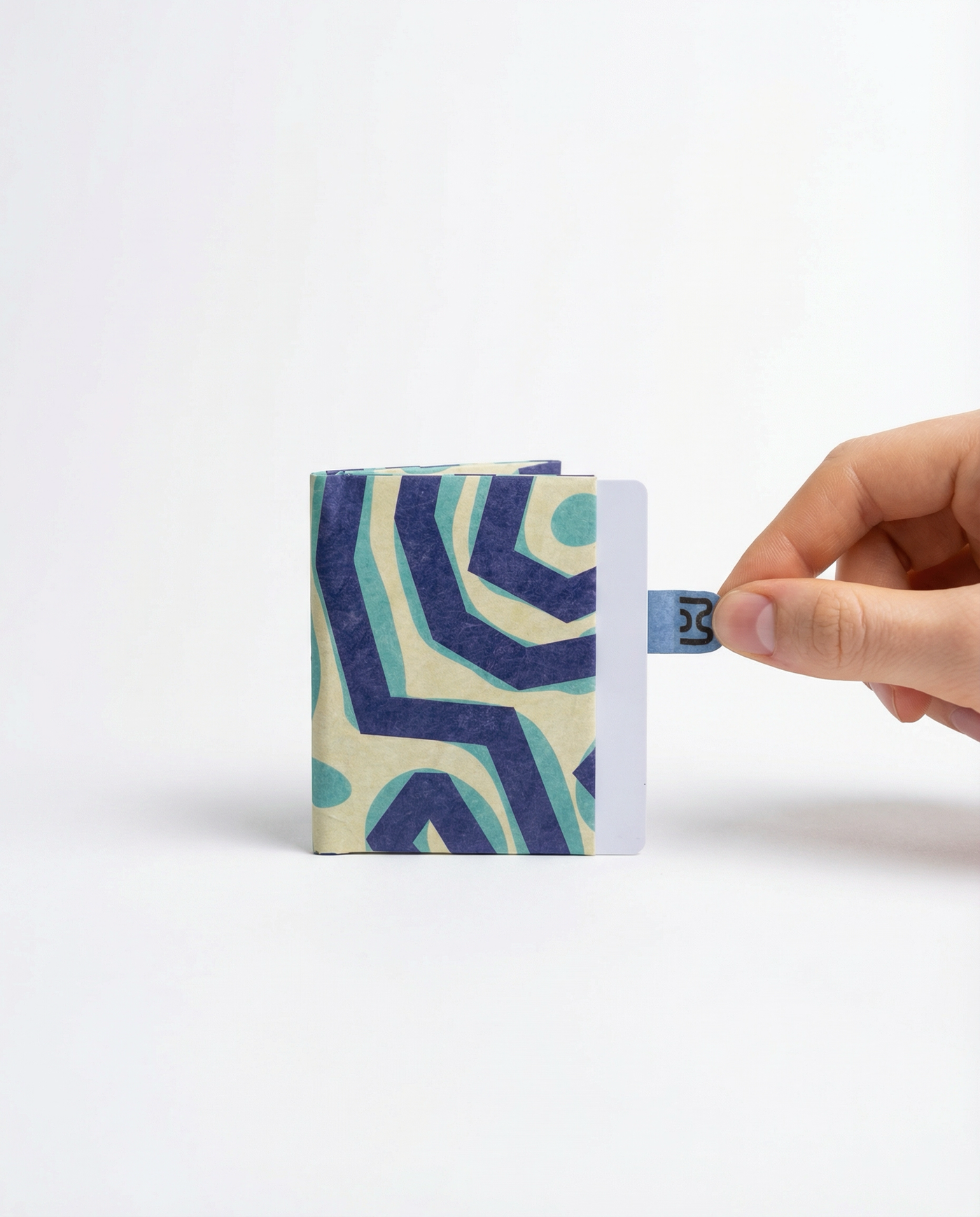 paths miniwallet with cards, pull-tab visible