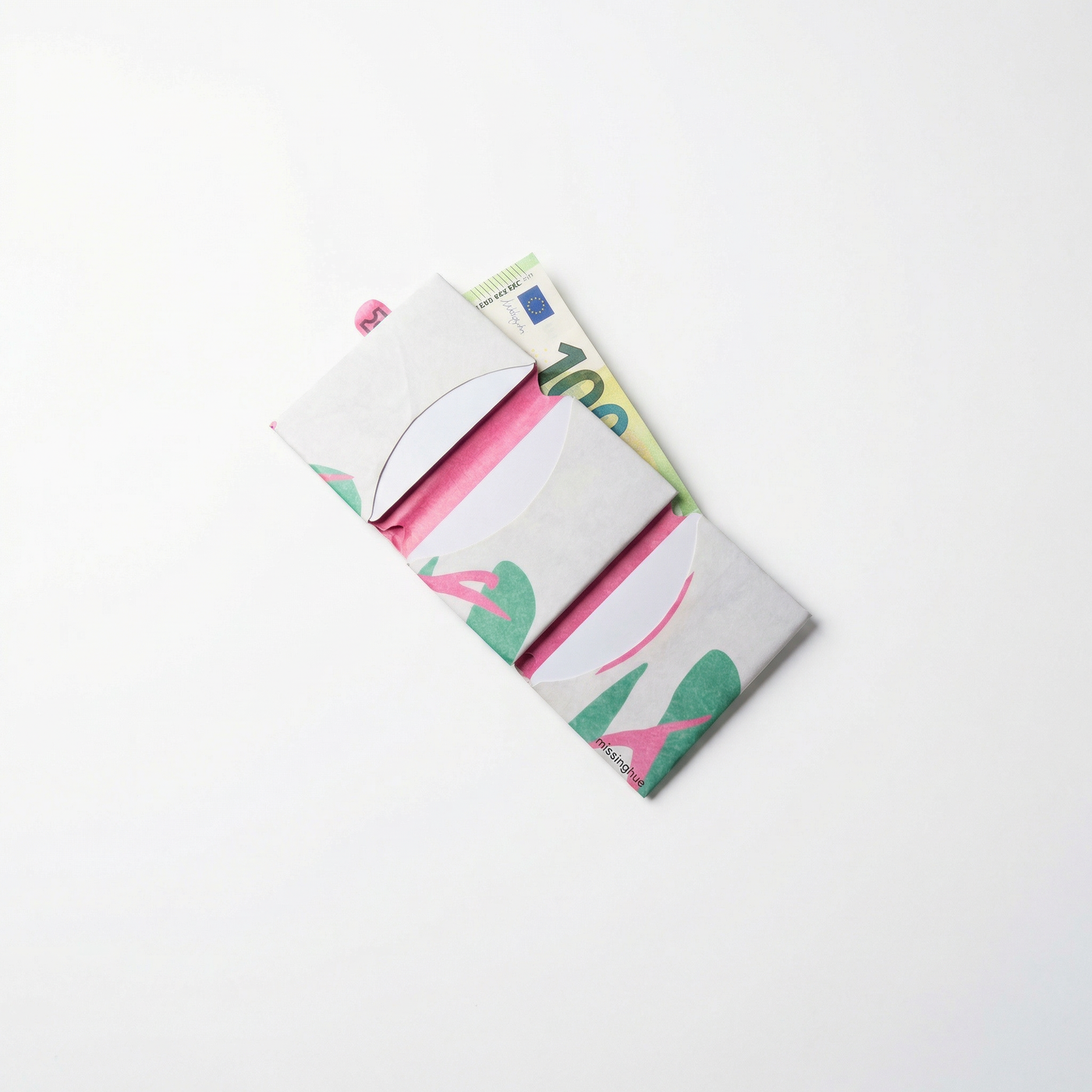 trippy miniwallet open with cash, bills lying flat